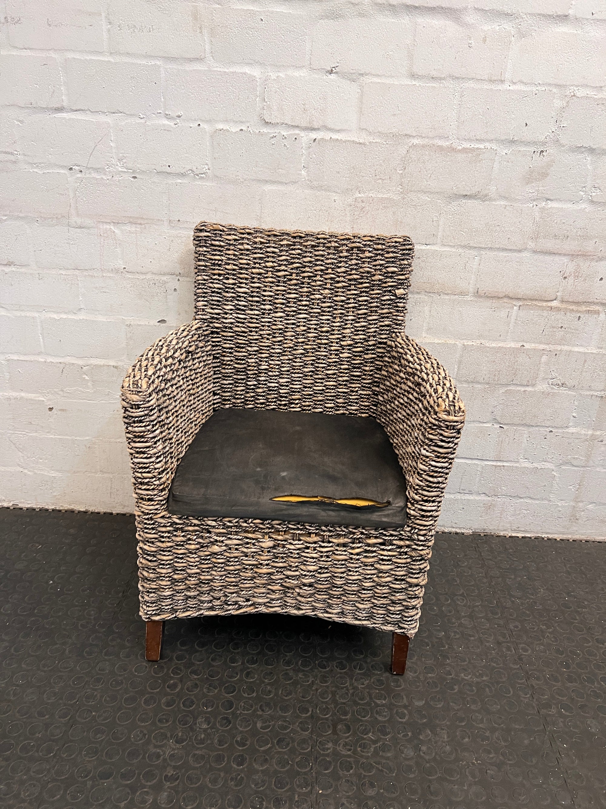 Wicker One Seater Sofa with Black Cushioned Seat (Cushion Needs Repair)