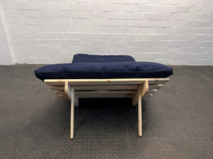 Dark Blue Covered Futon with Wooden Platform