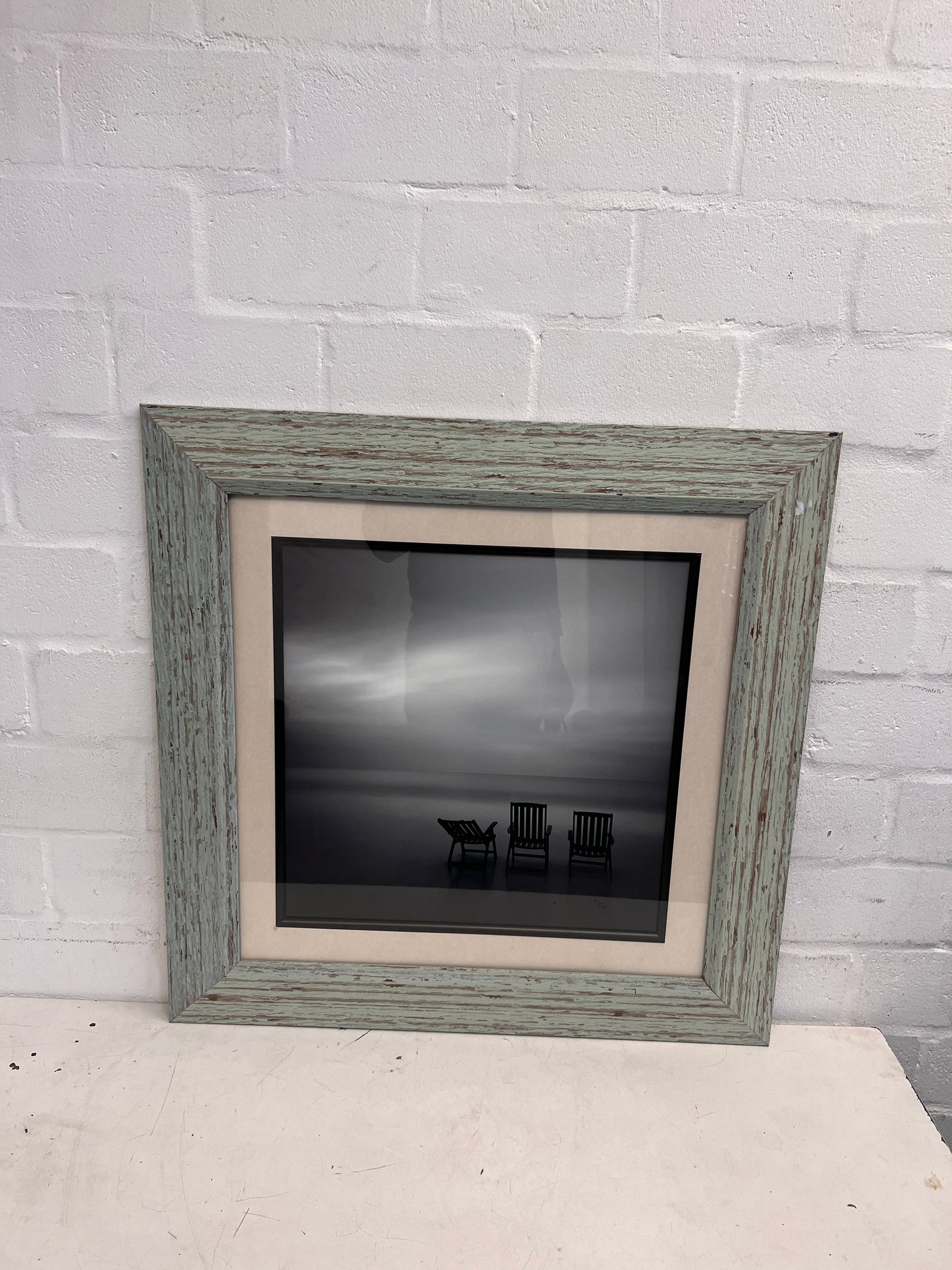 Black and White Loungers Overlooking The Horizon Framed Wall Art