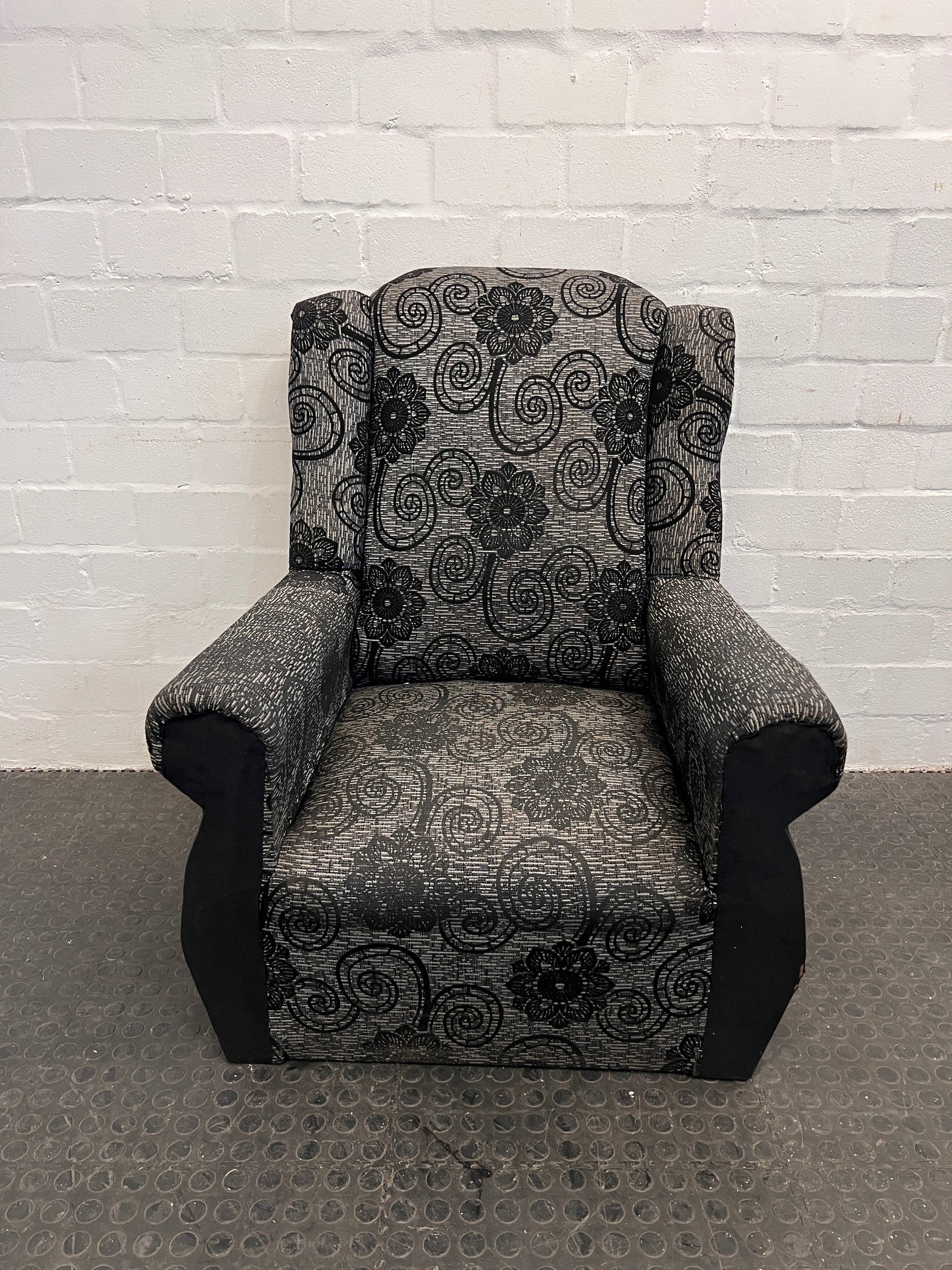 Black and Grey Floral Print One Seater Couch