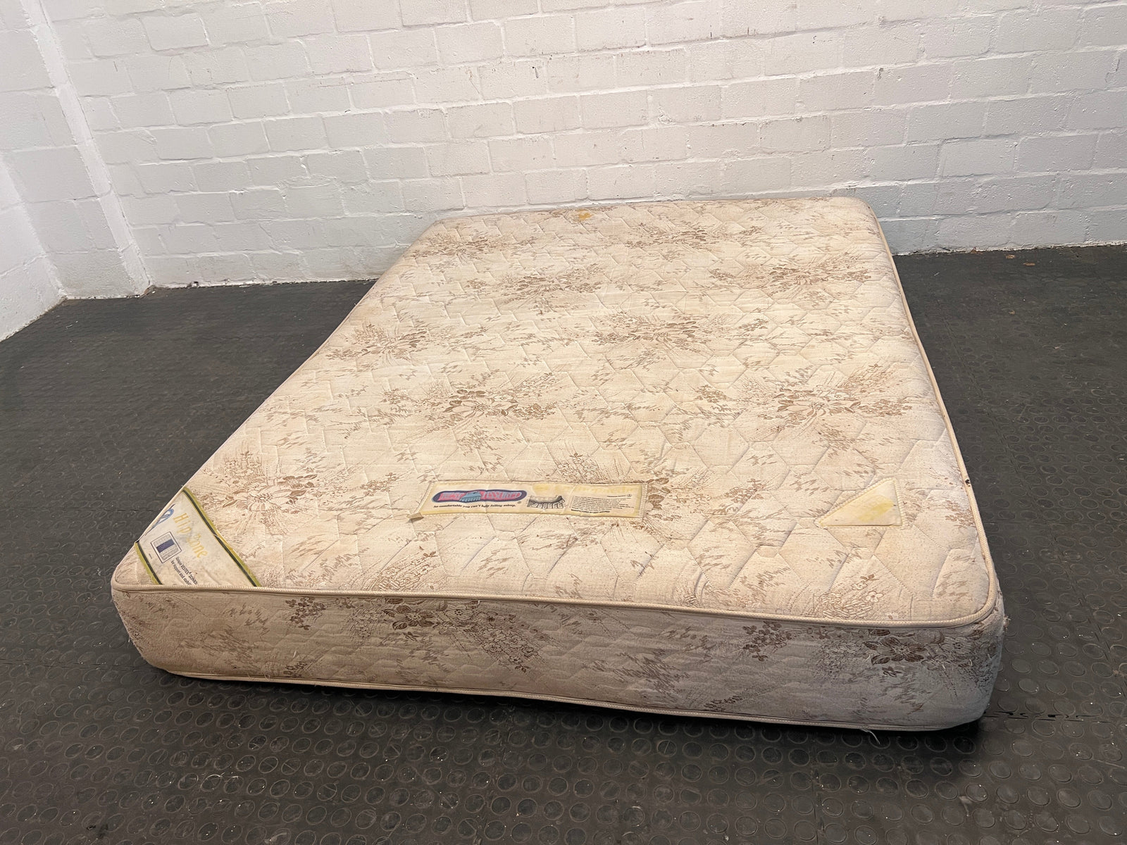 Rest Assured Queen Mattress (Stained and torn corners)