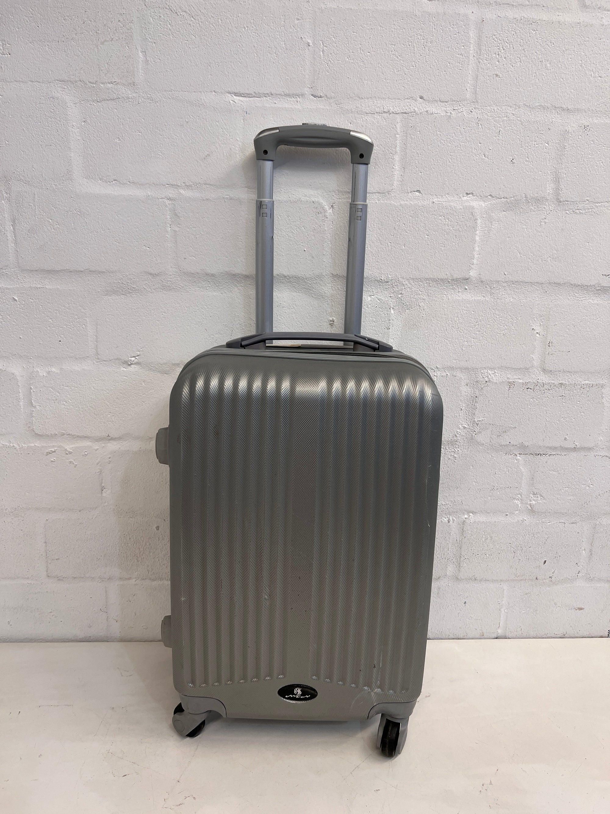 Grey Hard Shell Suitcase on Wheels