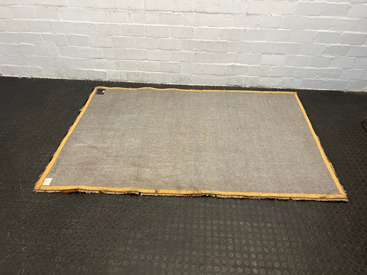 Light and dark brown rug 1.3m by 2.1m