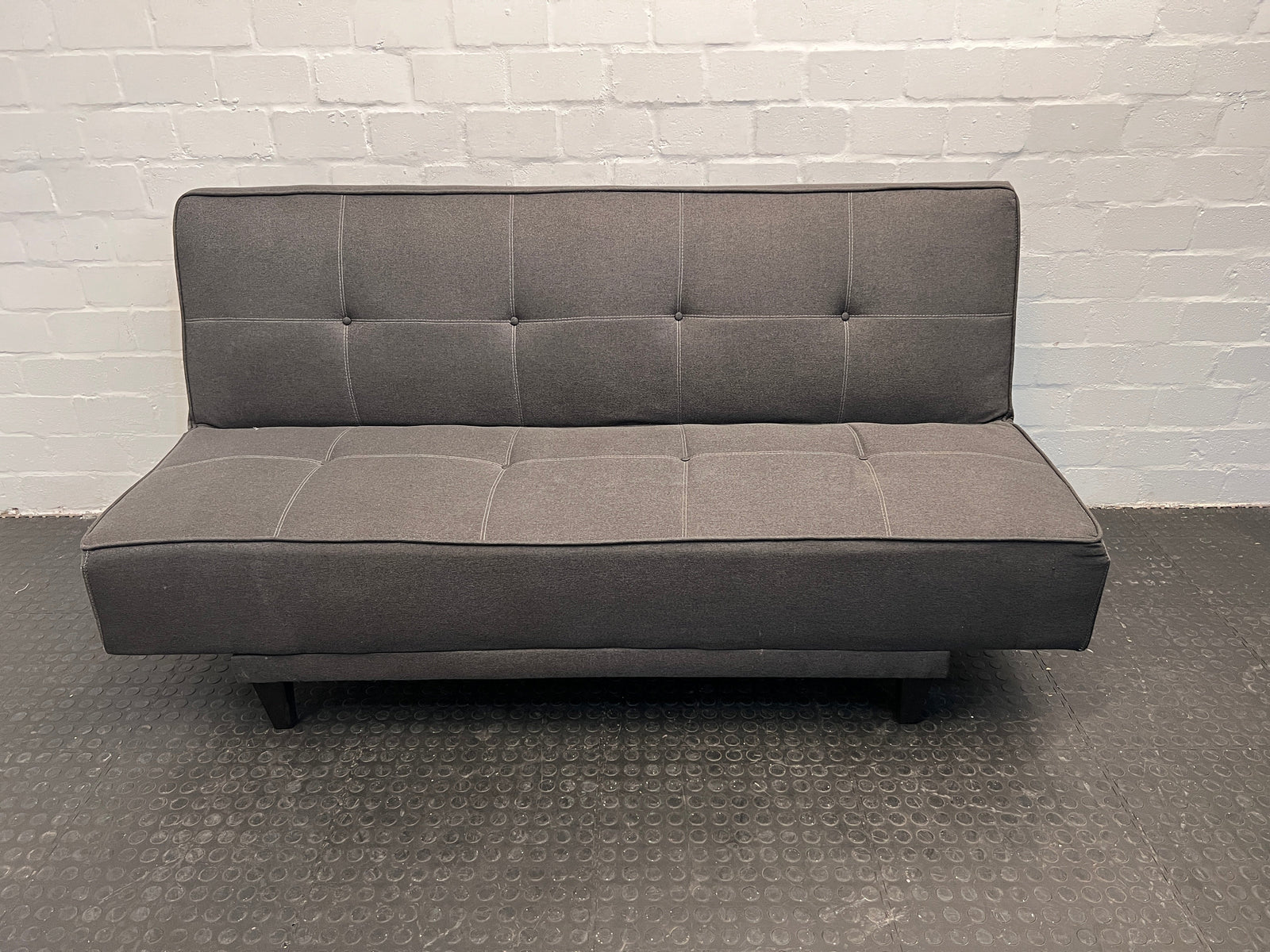 Grey Comfortable Sleeper Couch with Small Tear on the Side