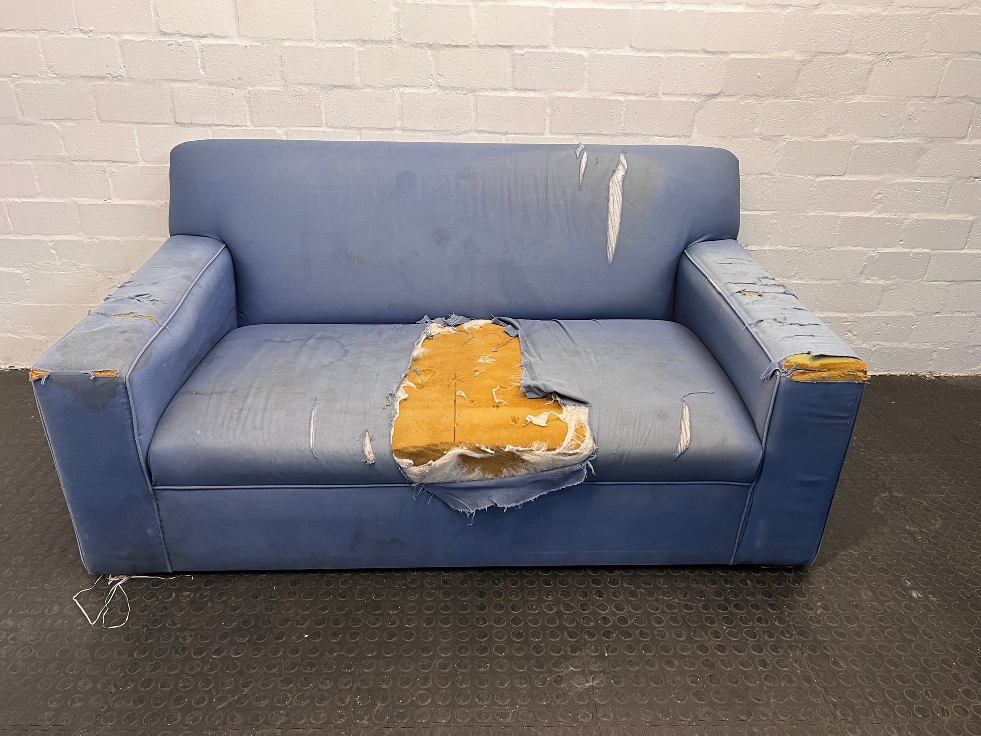 Three Seater Blue Couch with Torn Cushions and Armrest - REDUCED