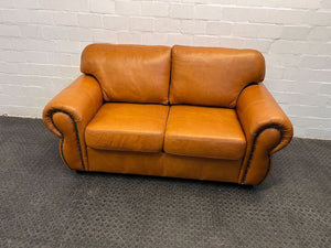 Tan Leather Master Two Seater Couch with Studded Arm Rest