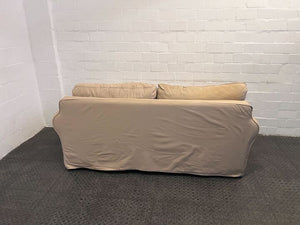 Beige Three Seater Couch with Slip Cover