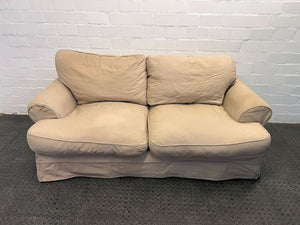 Beige Three Seater Couch with Slip Cover