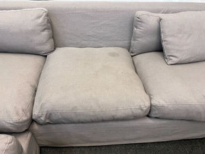 Gray L-Shaped Slip Cover Couch (Missing Back Cushion)