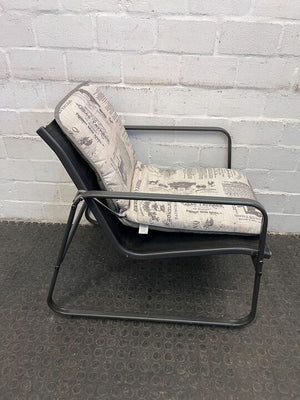 Black Steel Framed Newspaper Patterned Cushioned Outdoor Patio Chair