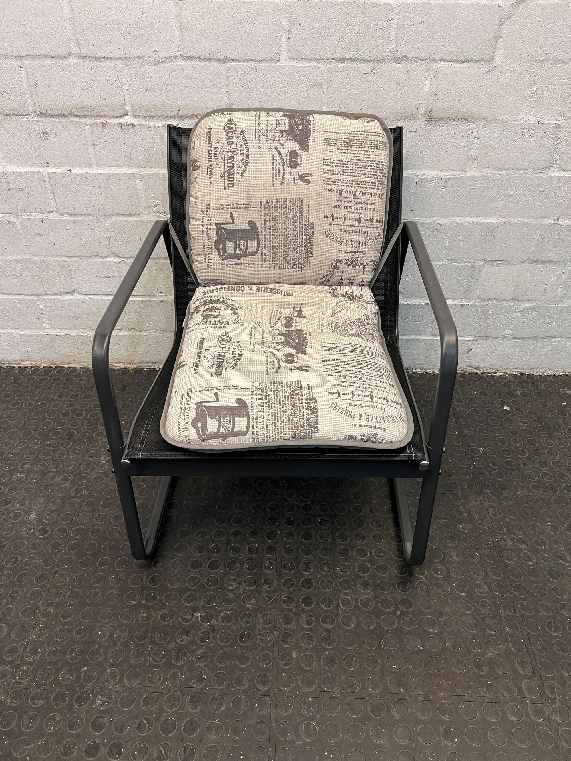 Black Steel Framed Newspaper Patterned Cushioned Outdoor Patio Chair