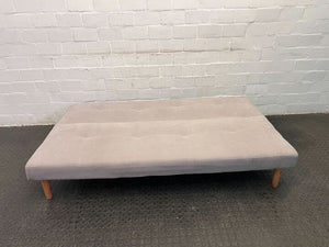 White Upholstered Peg Legged Sleeper Couch