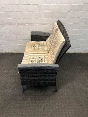 Dark Gray Woven Two Seater Patio Couch with Newspaper Patterned Cushions