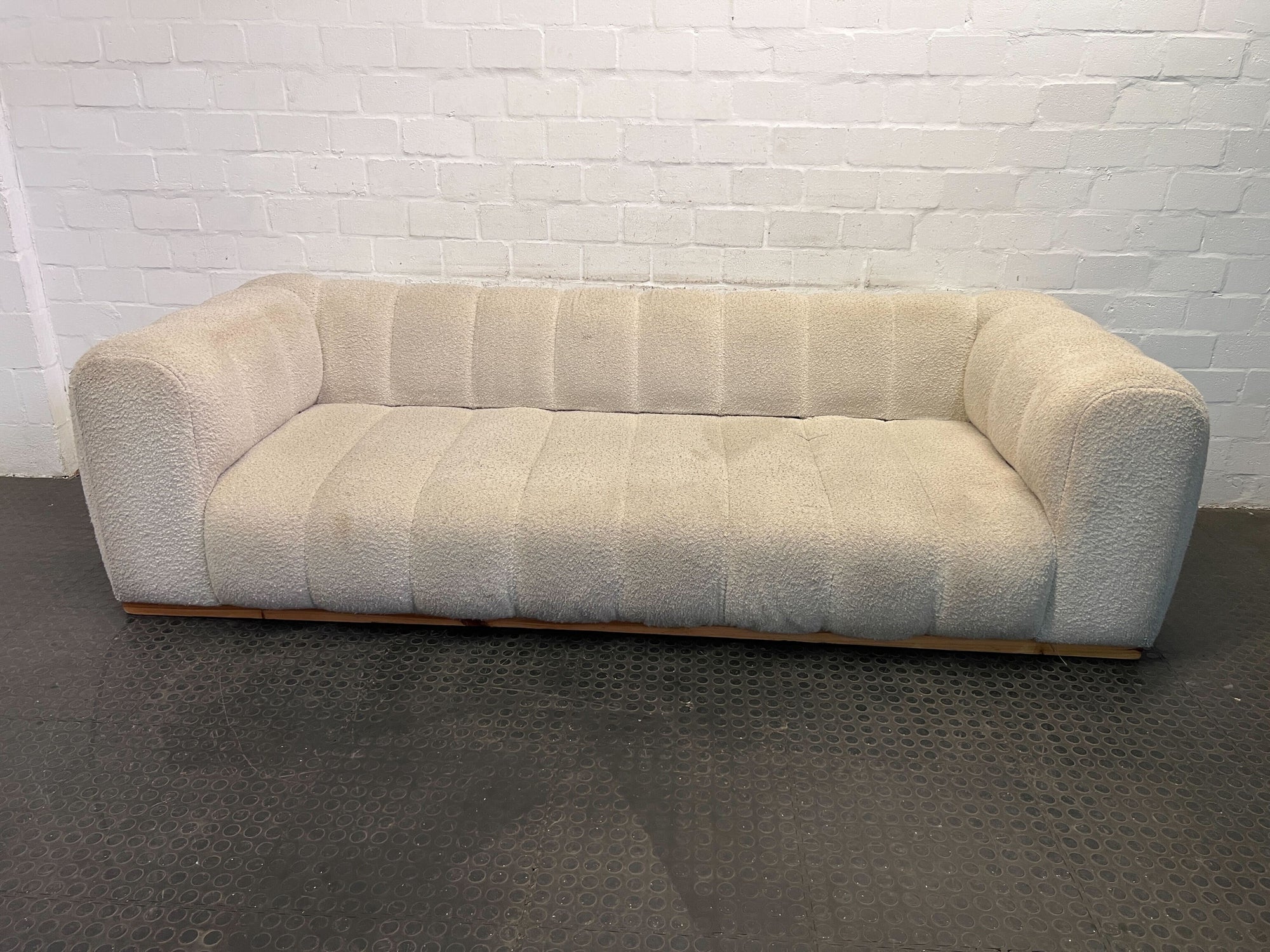 Puffed White Four Seater Couch with Wooden Frame