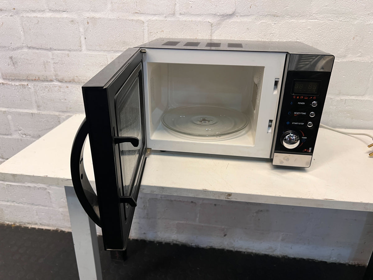Compact Stainless Steel Microwave Oven – Efficient & Stylish