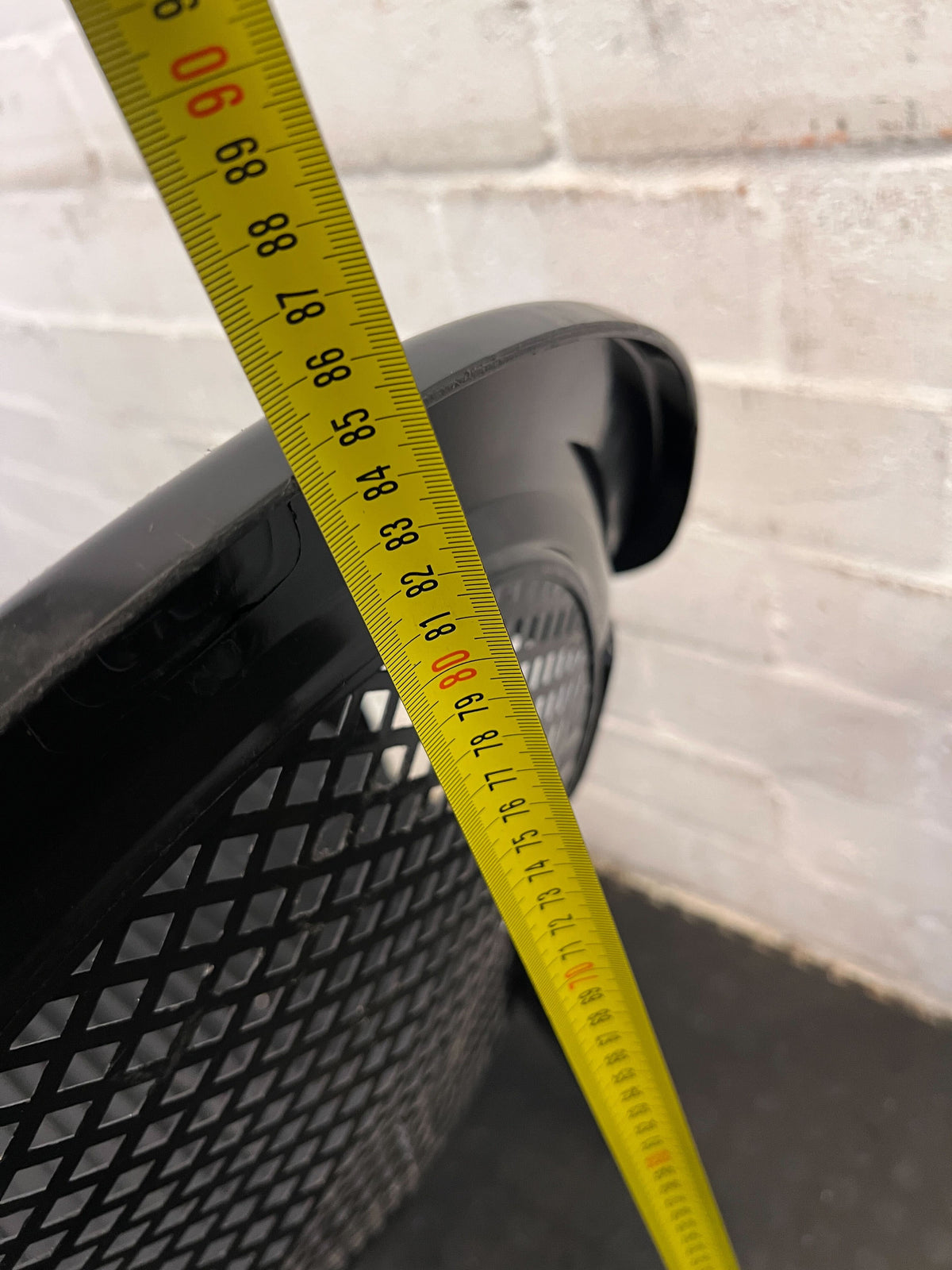 Sturdy Black Plastic Chair with Armrests – Durable & Easy to Clean