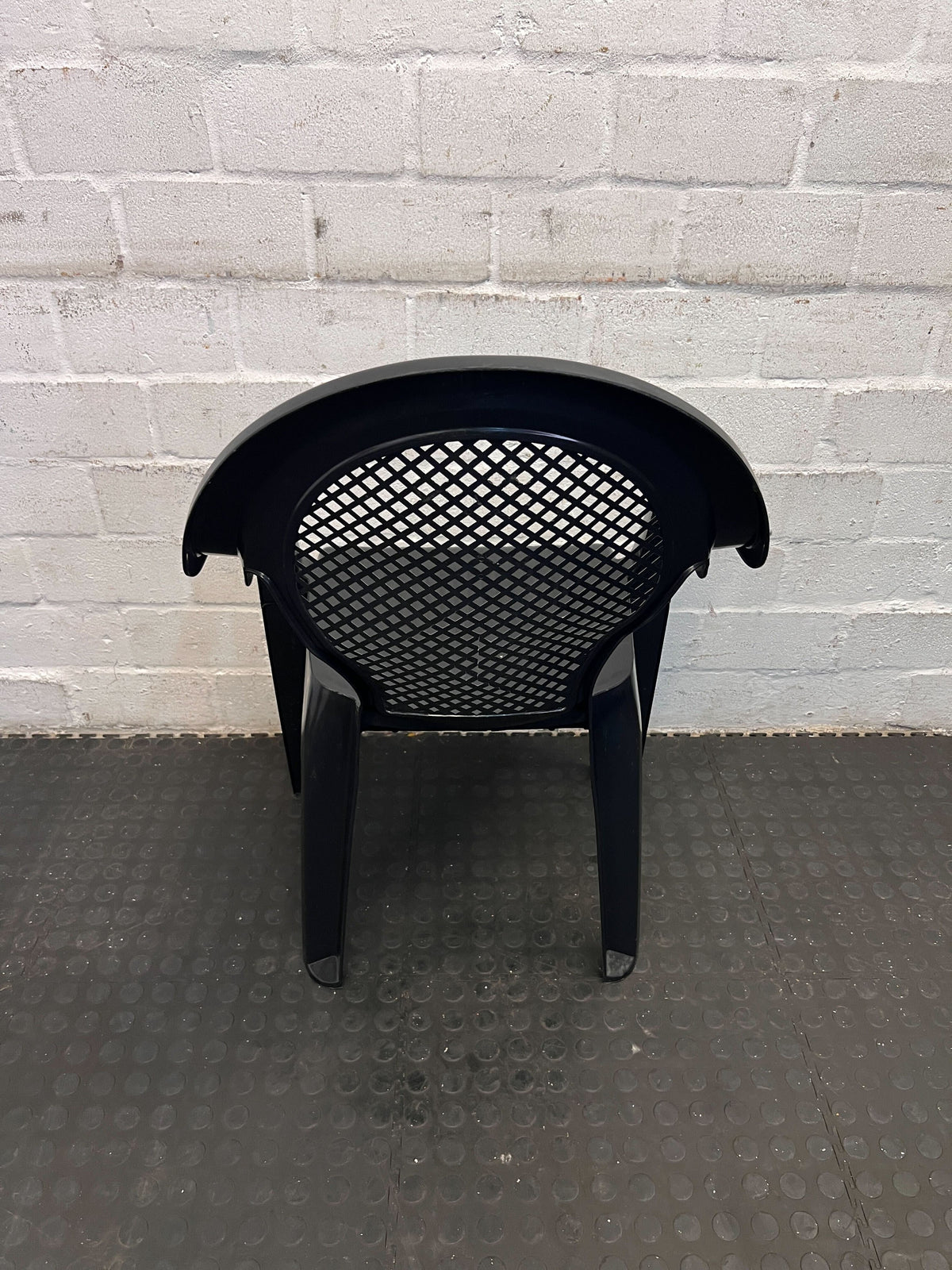 Sturdy Black Plastic Chair with Armrests – Durable & Easy to Clean