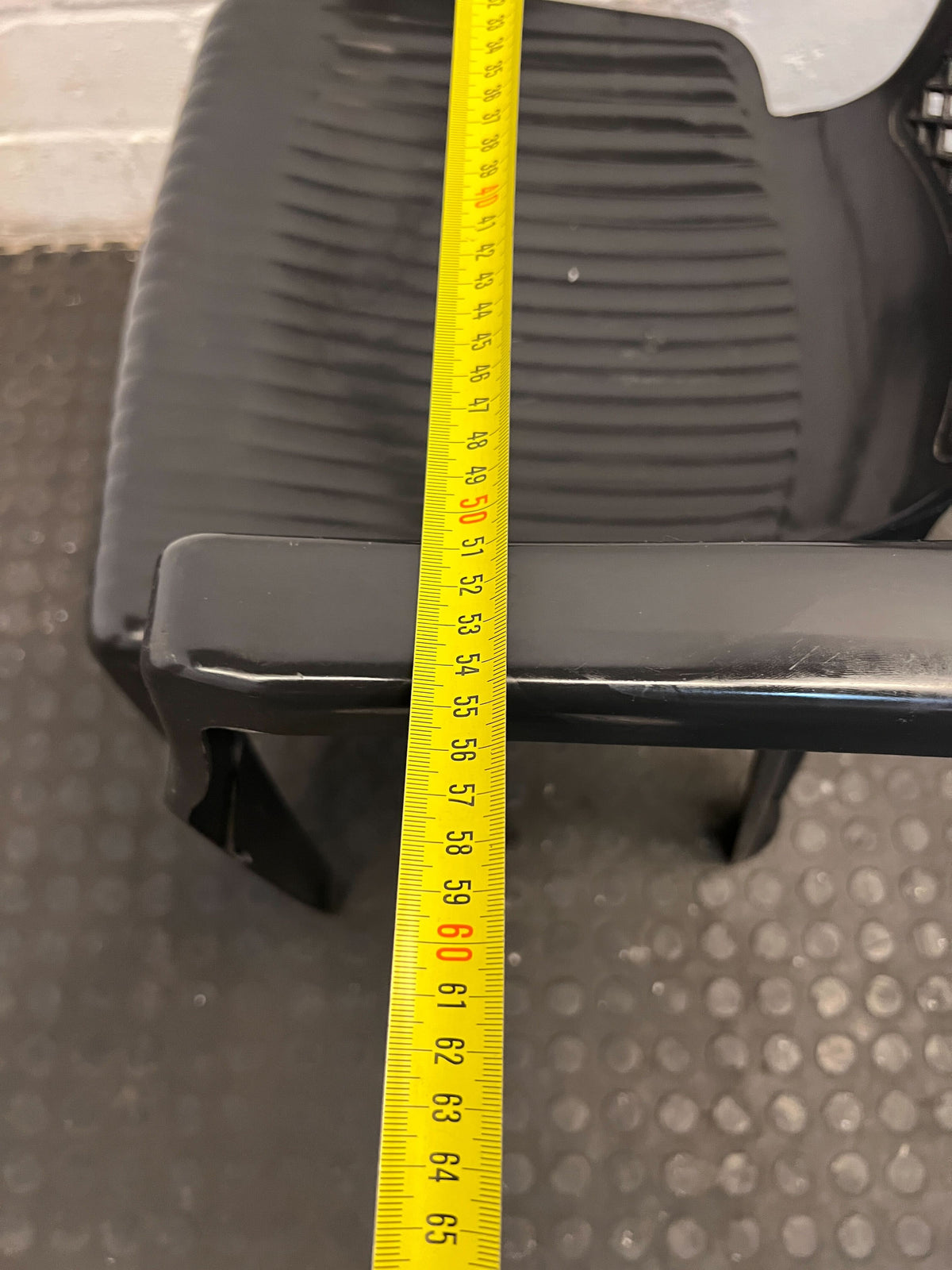 Sturdy Black Plastic Chair with Armrests – Durable & Easy to Clean