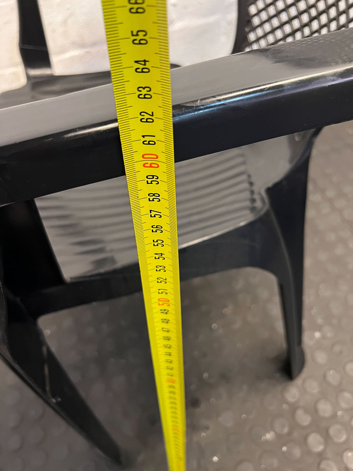 Sturdy Black Plastic Chair with Armrests – Durable & Easy to Clean