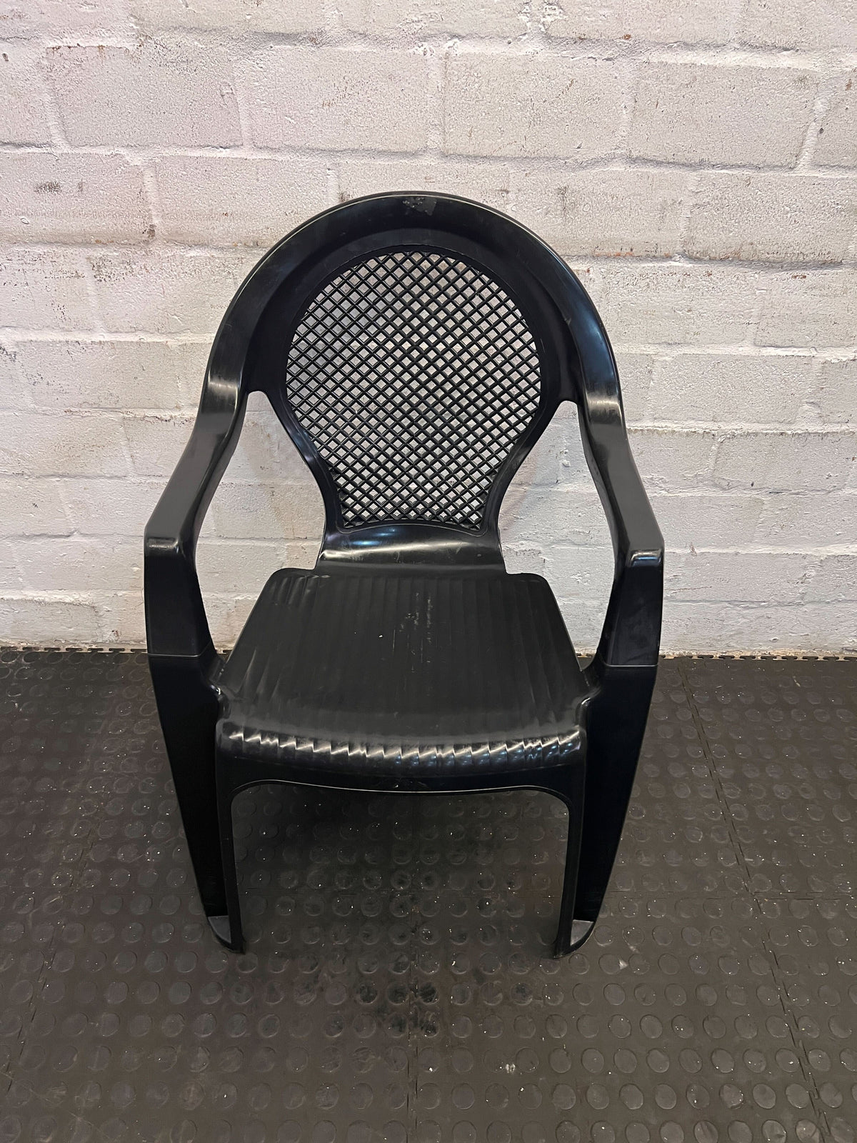 Sturdy Black Plastic Chair with Armrests – Durable & Easy to Clean