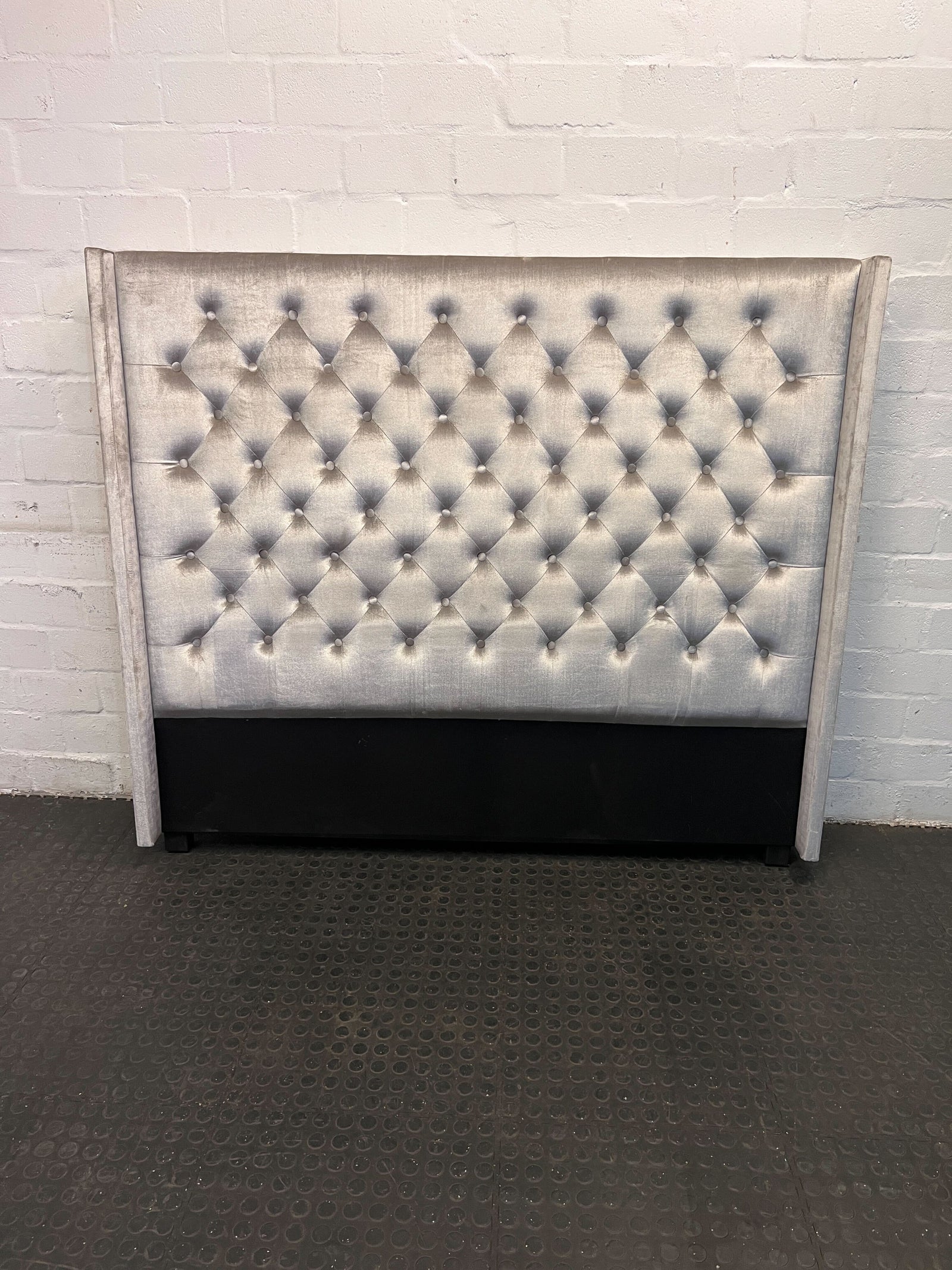 Elegant Grey Upholstered Headboard with Tufted Detailing