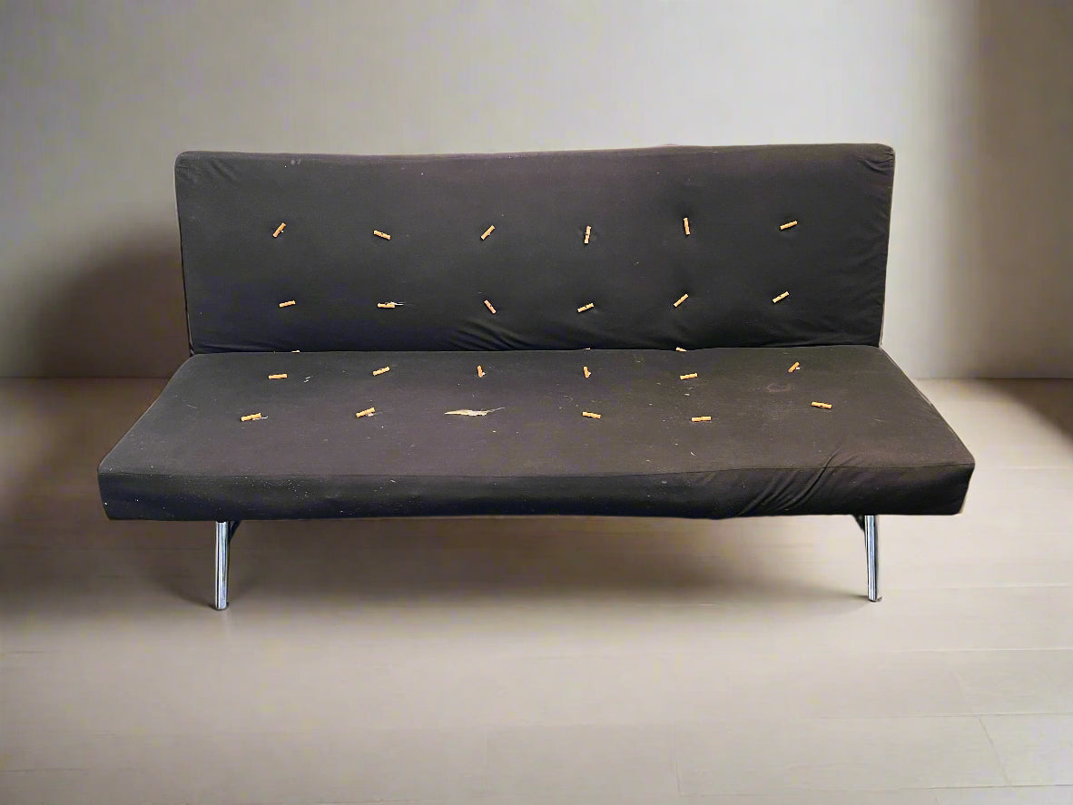 Chic Black Fabric Sofa Bed with Minor Wear