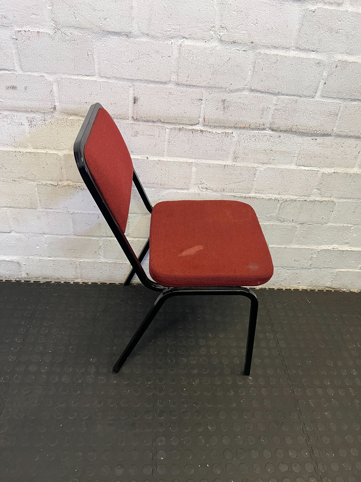 Sturdy Red Fabric Chair with Black Metal Frame - Minor Wear