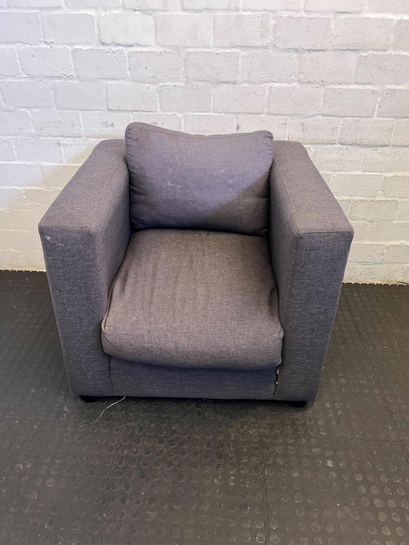 Stylish Grey Fabric Armchair with Minor Wear