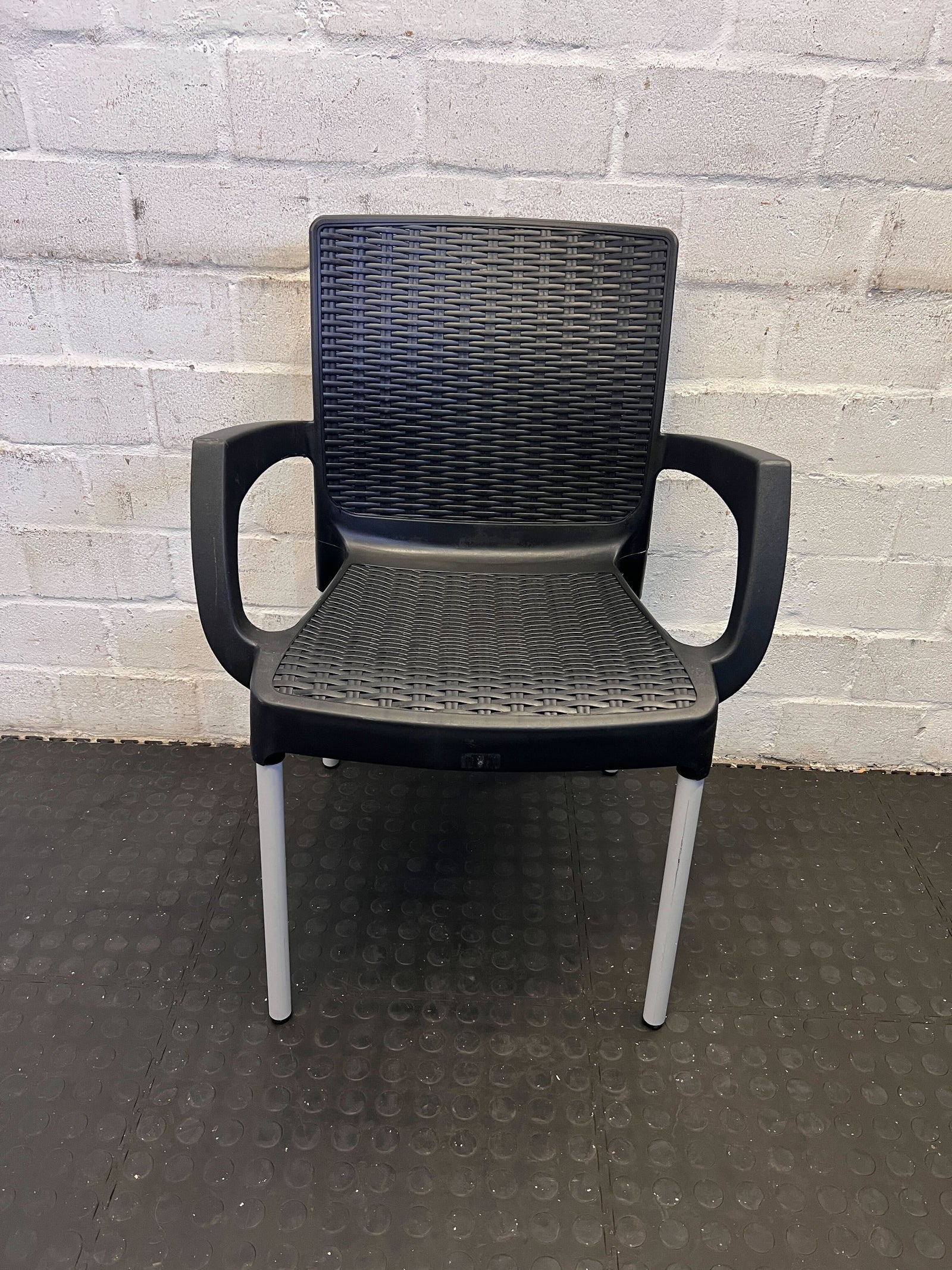 Stylish Black Plastic Dining Chair with Woven Design & Armrests