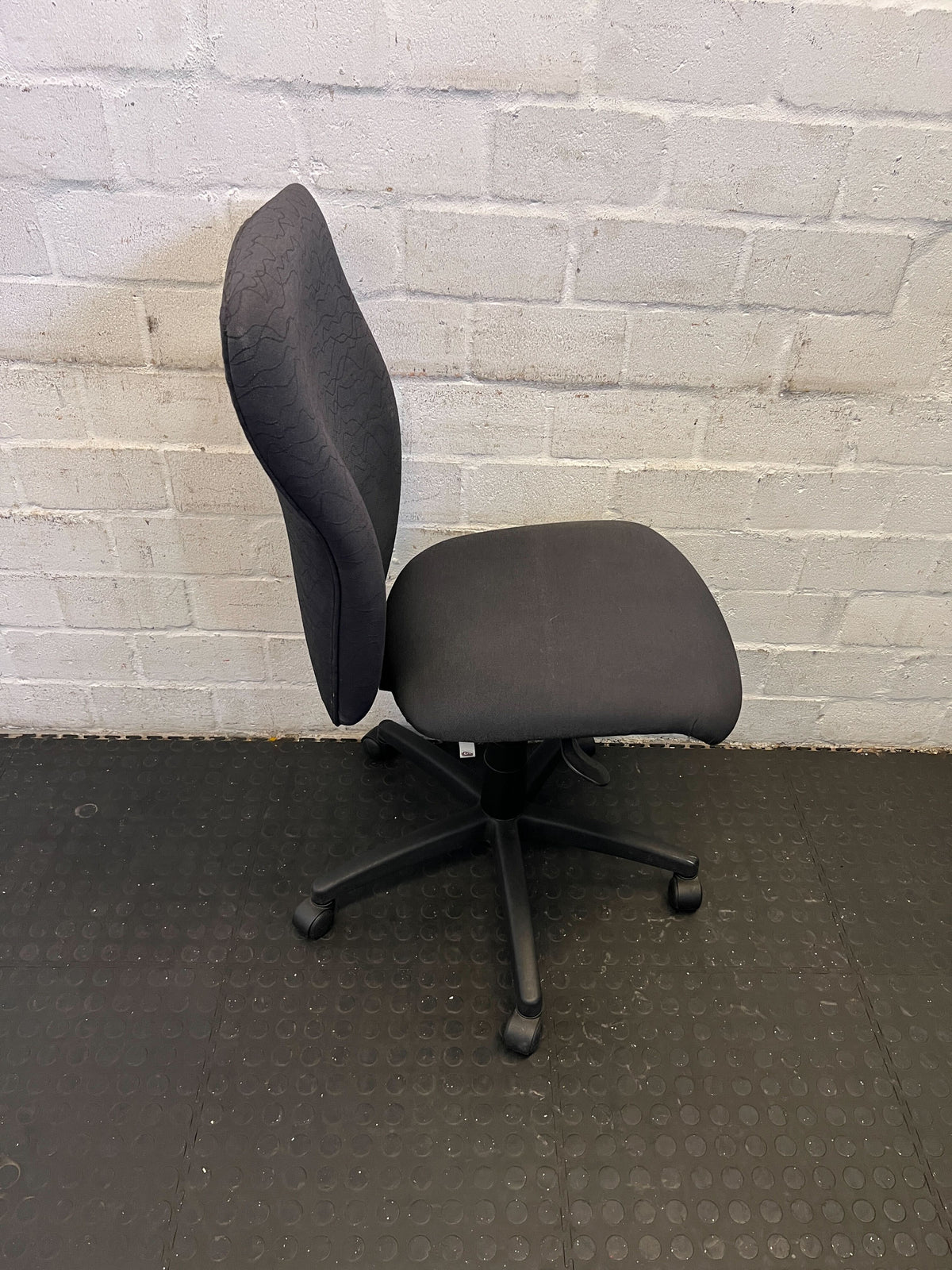 Comfortable Black Fabric Office Chair with Minor Wear