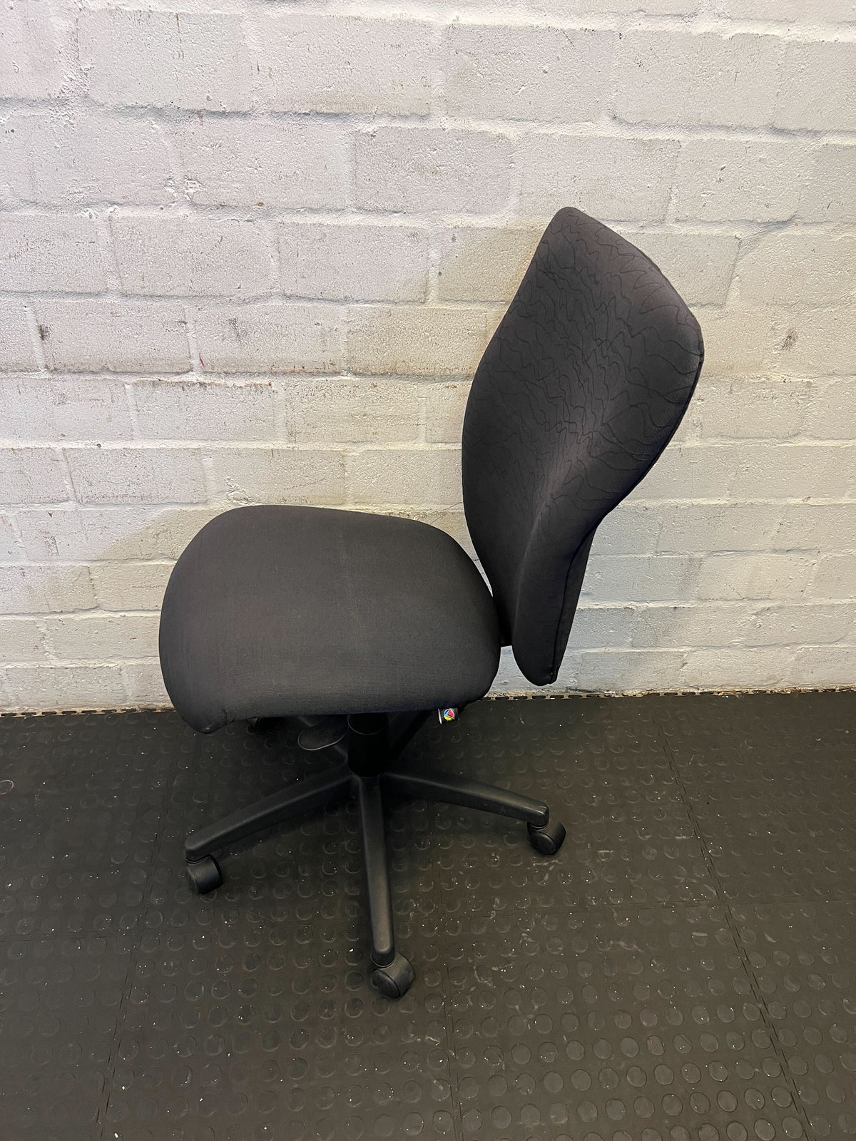 Comfortable Black Fabric Office Chair with Minor Wear