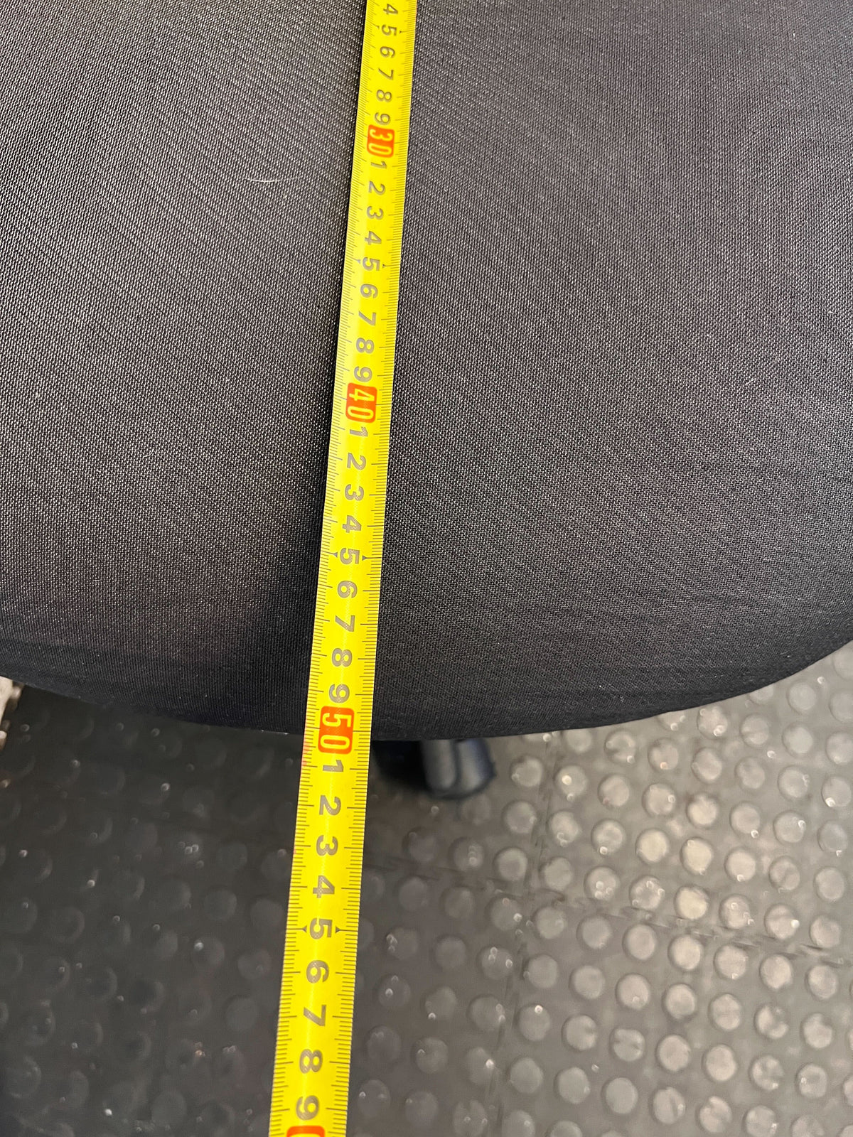 Comfortable Black Fabric Office Chair with Minor Wear