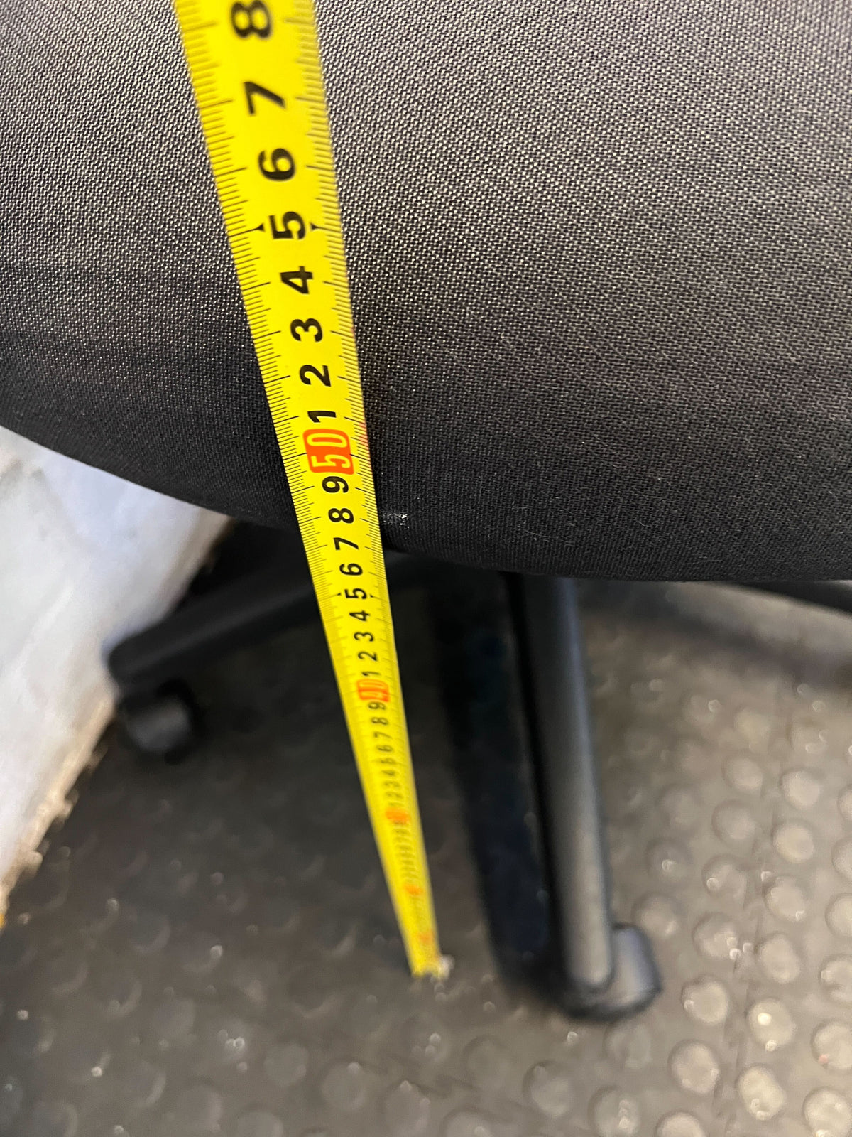 Comfortable Black Fabric Office Chair with Minor Wear