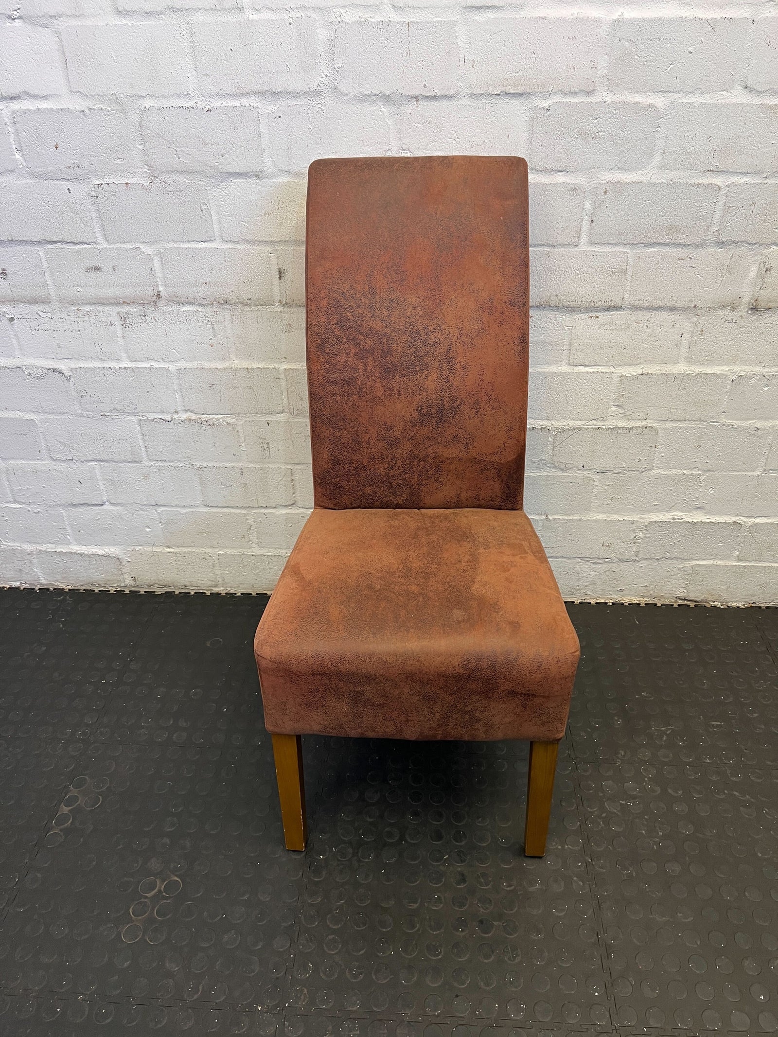Stylish Rust-Colored Upholstered Dining Chair with Minor Wear