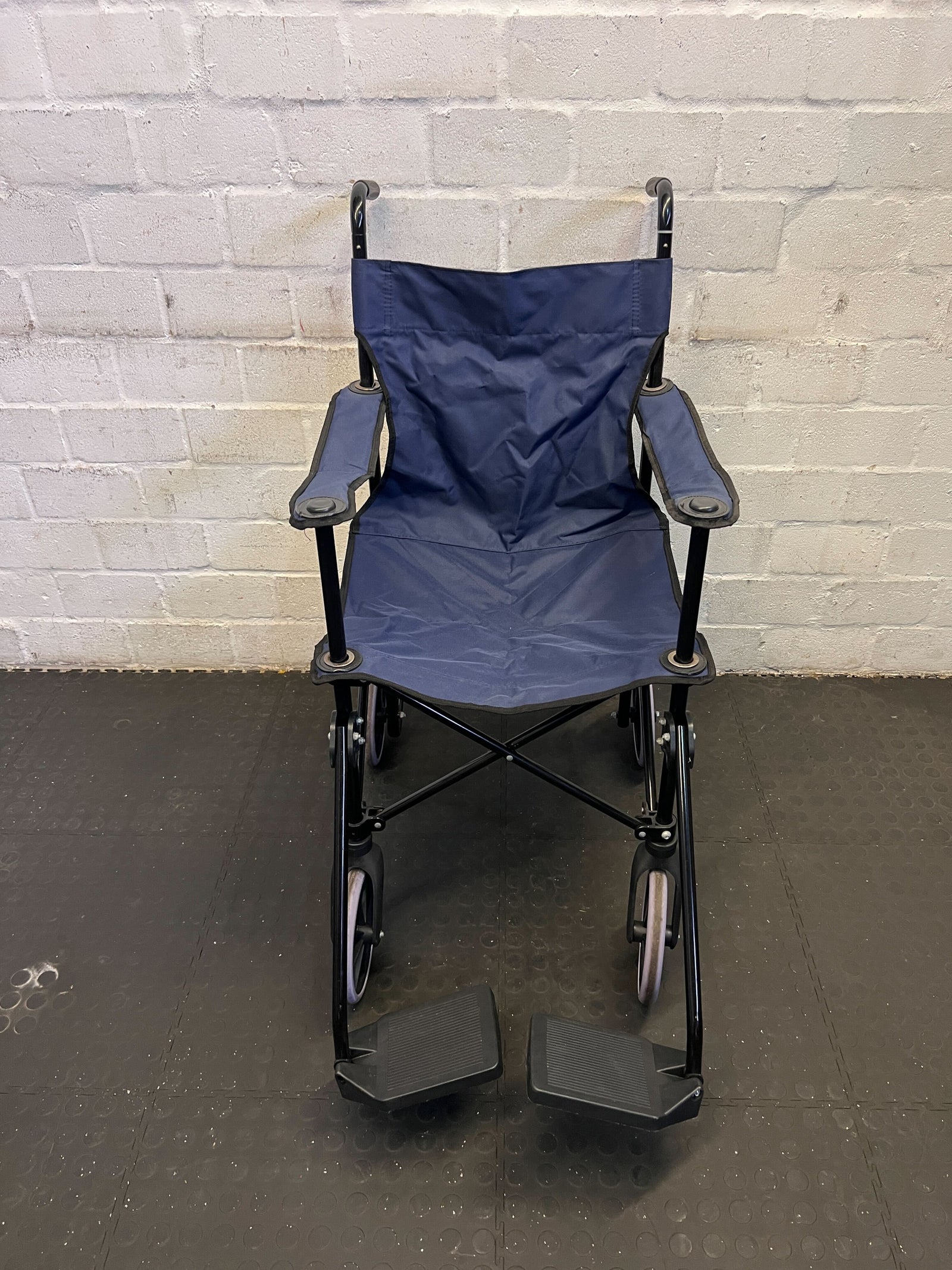 Compact Navy Blue Folding Wheelchair with Minor Wear