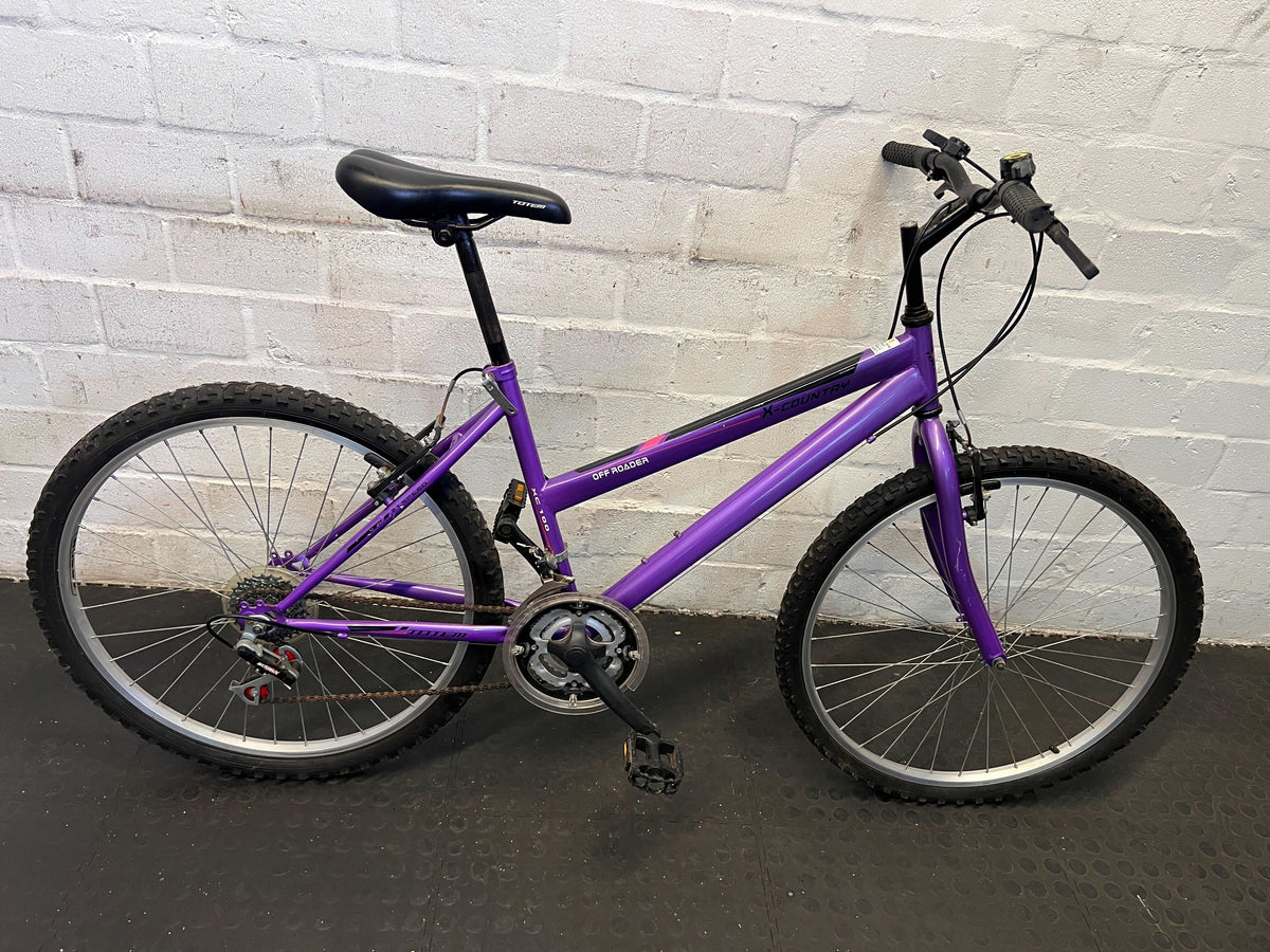Vibrant Purple Mountain Bike – Slight Wear, Ready for Adventure!
