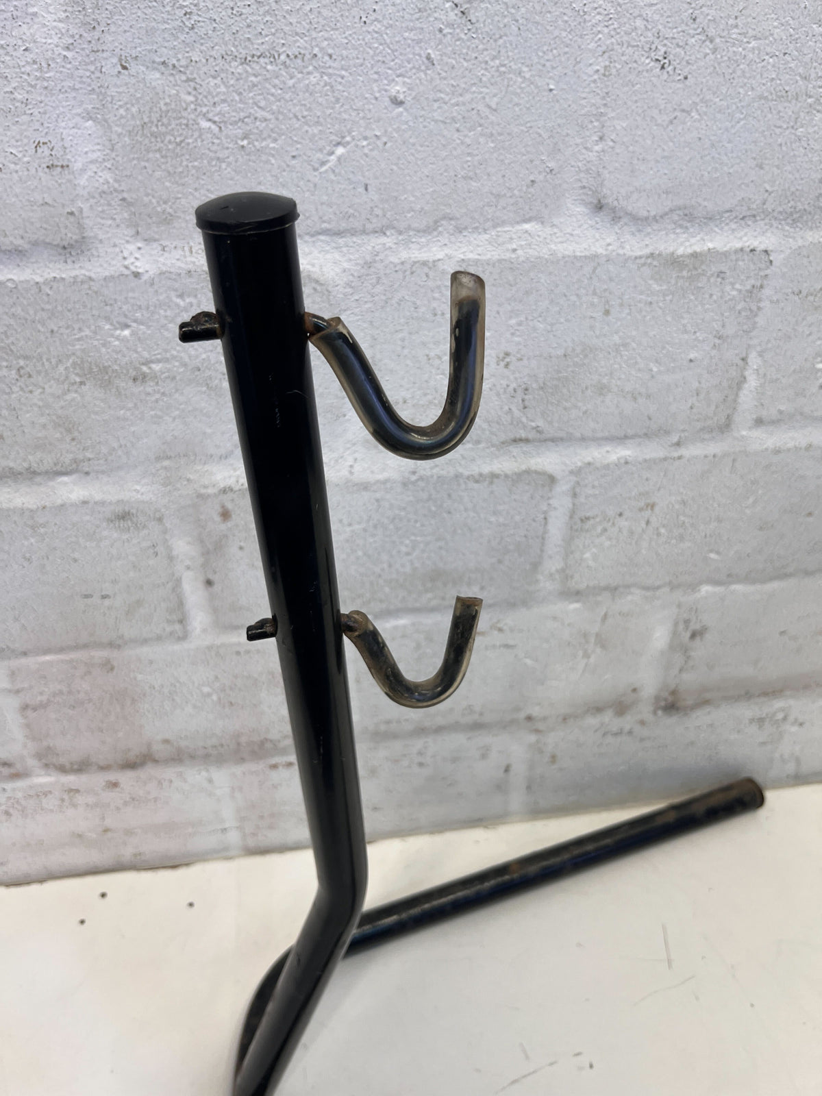 Durable Black Metal Bike Leg Support – Slight Wear