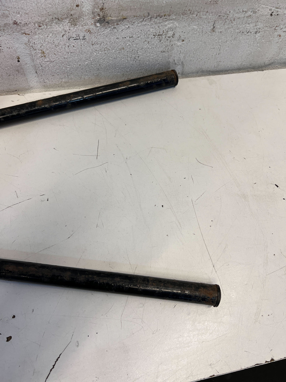 Durable Black Metal Bike Leg Support – Slight Wear