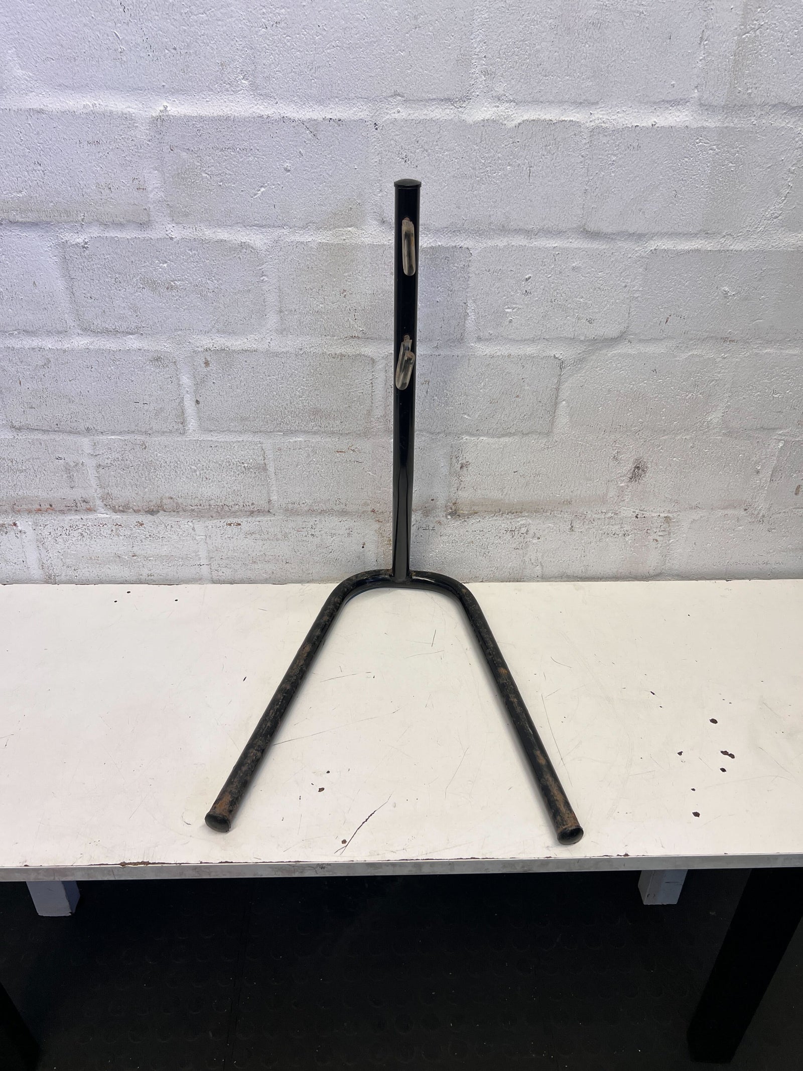 Durable Black Metal Bike Leg Support – Slight Wear