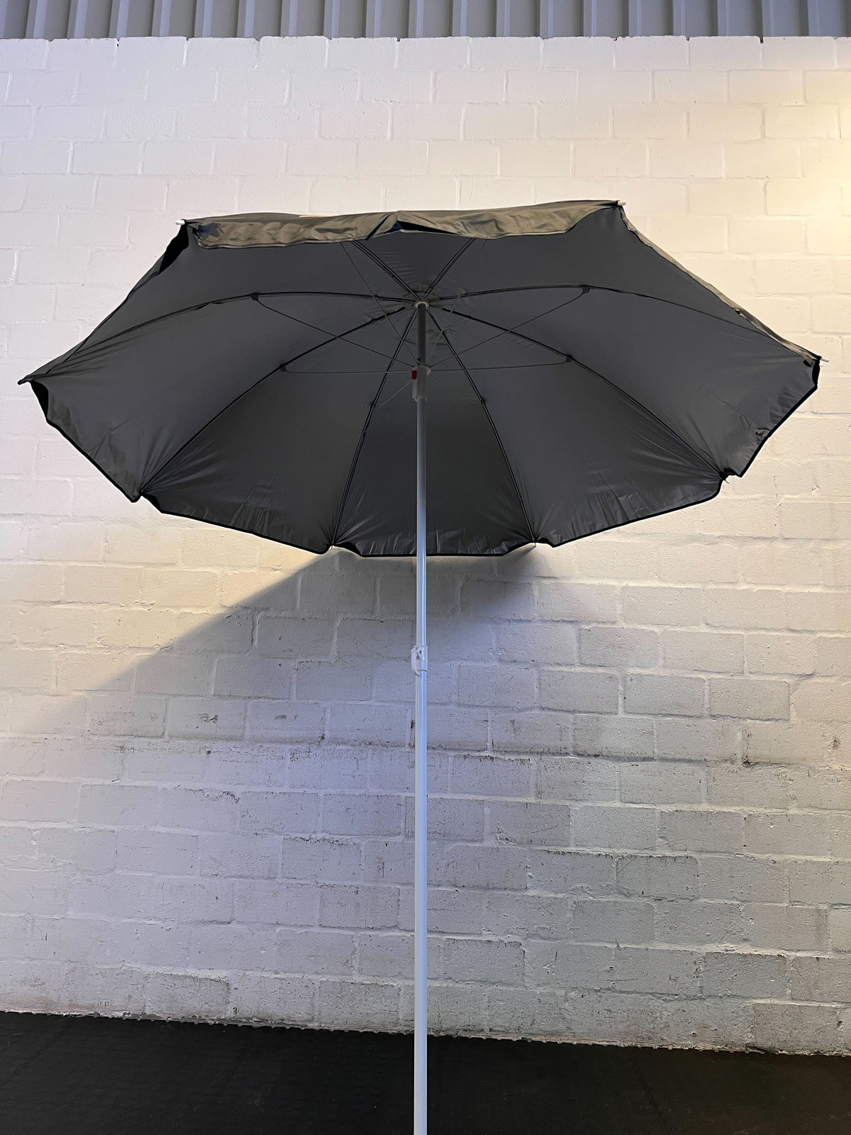 Stylish Black Kodak Batteries Beach Umbrella – Slight Wear