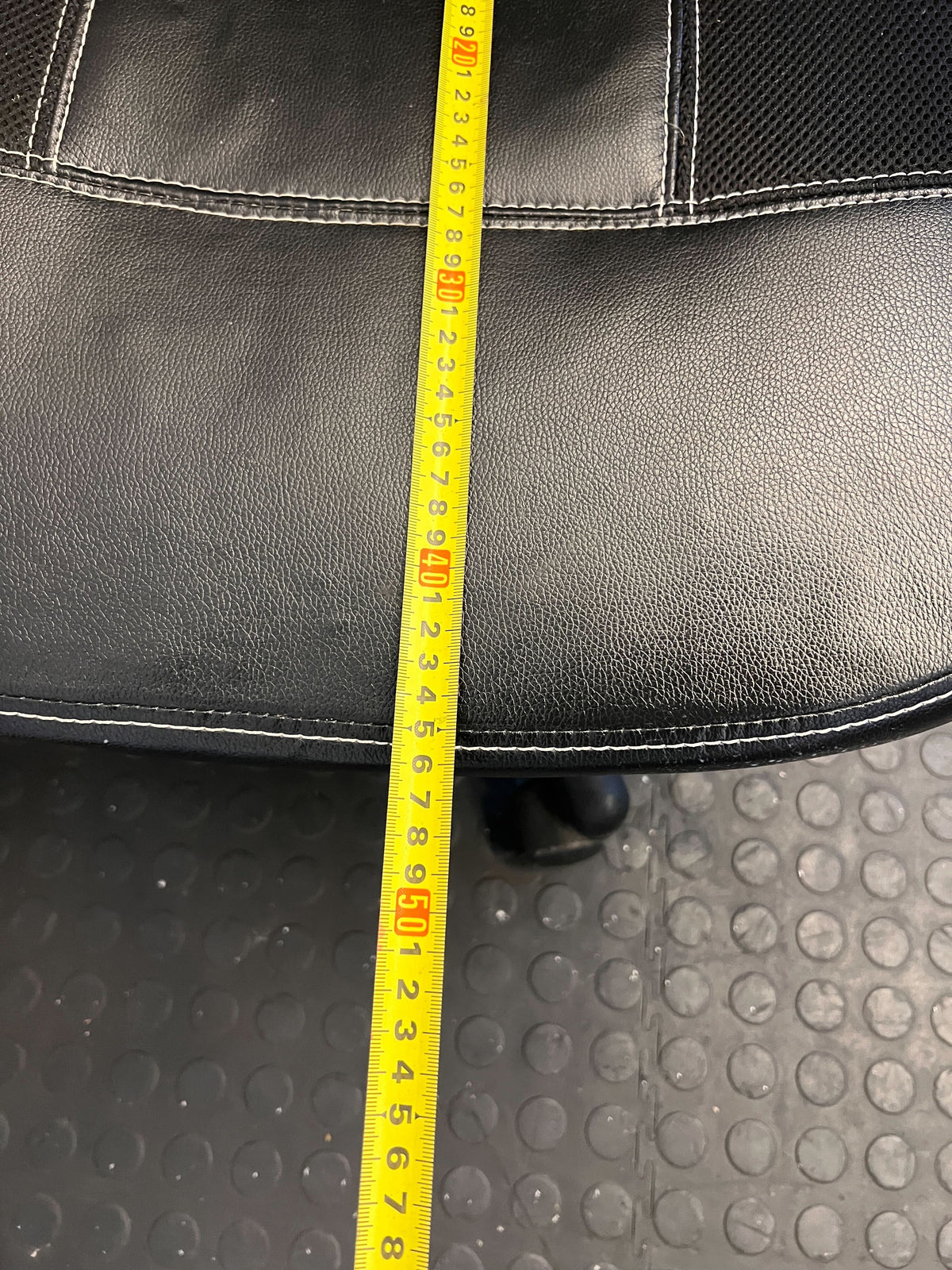 Comfortable Black Office Chair with Minor Wear and Adjustable Height