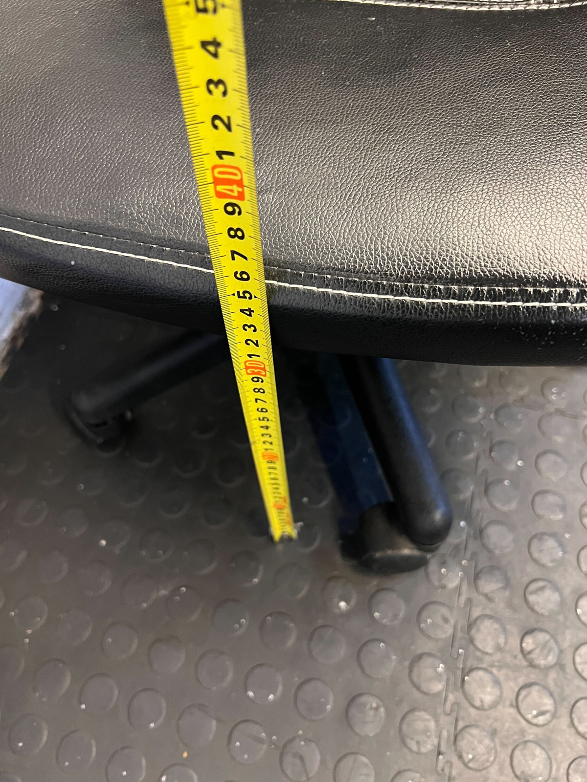 Comfortable Black Office Chair with Minor Wear and Adjustable Height