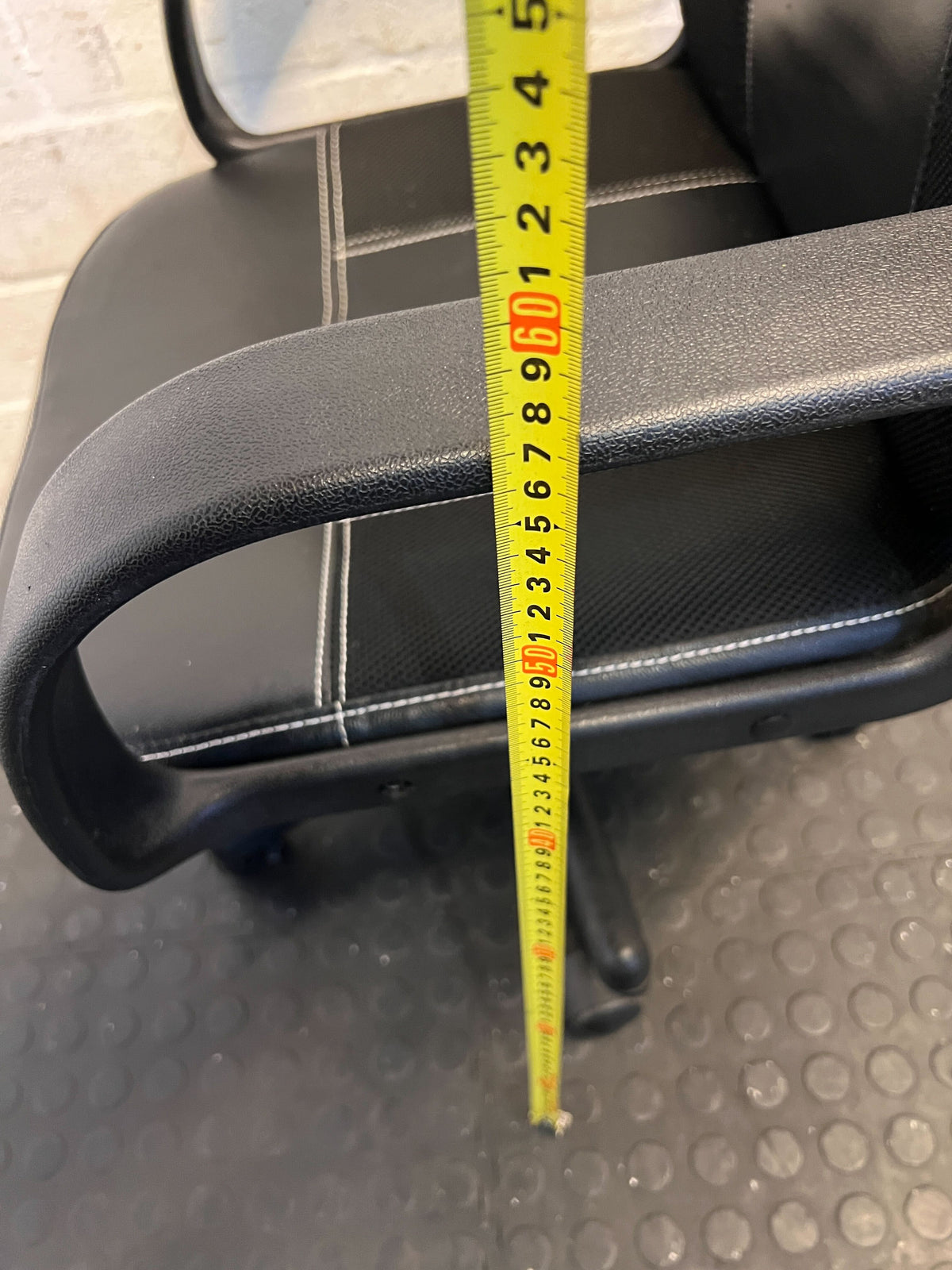 Comfortable Black Office Chair with Minor Wear and Adjustable Height