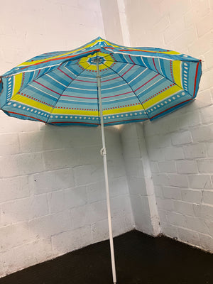 Vibrant Blue Beach Umbrella with Colorful Stripes