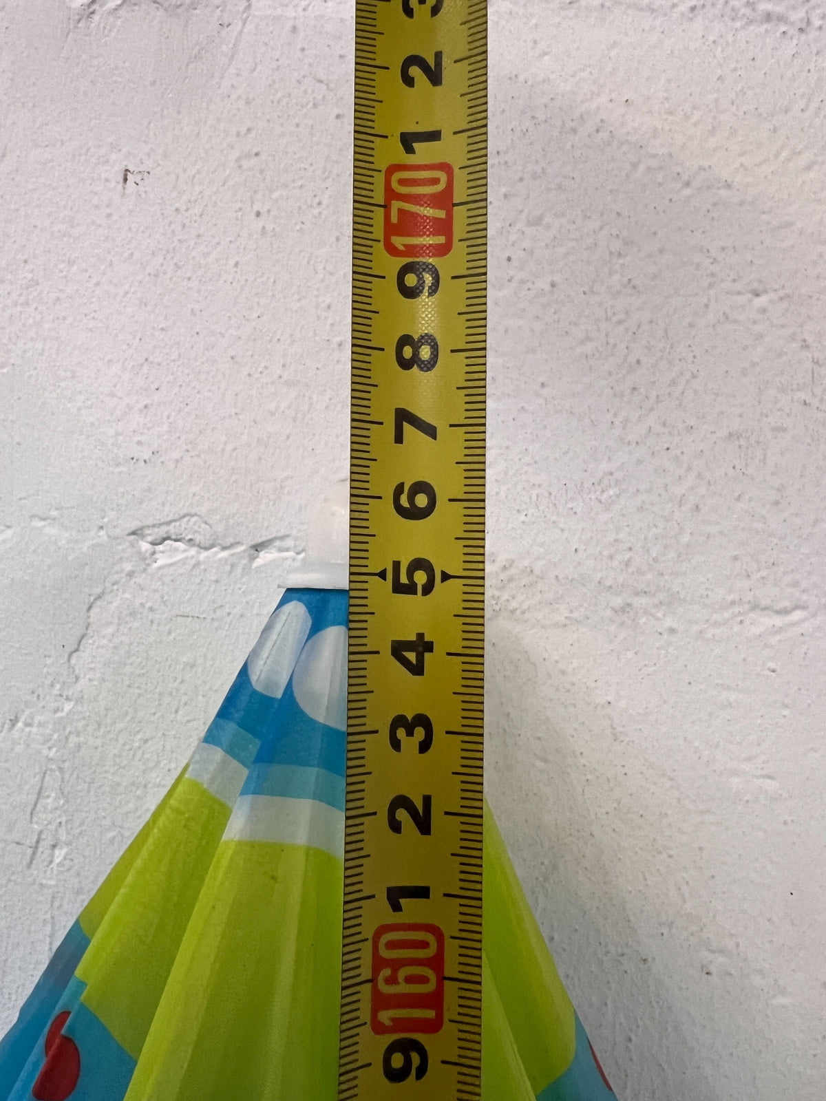 Vibrant Blue Beach Umbrella with Colorful Stripes