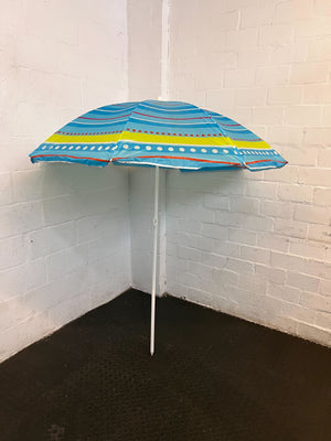 Vibrant Blue Beach Umbrella with Colorful Stripes