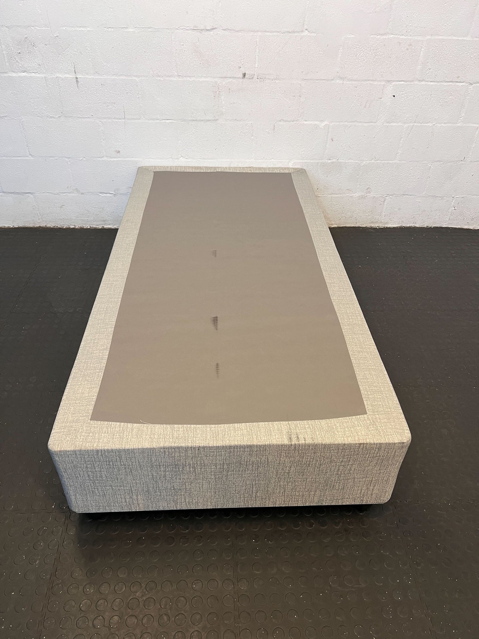 Elegant Grey Upholstered Single bed base with Minor Marks