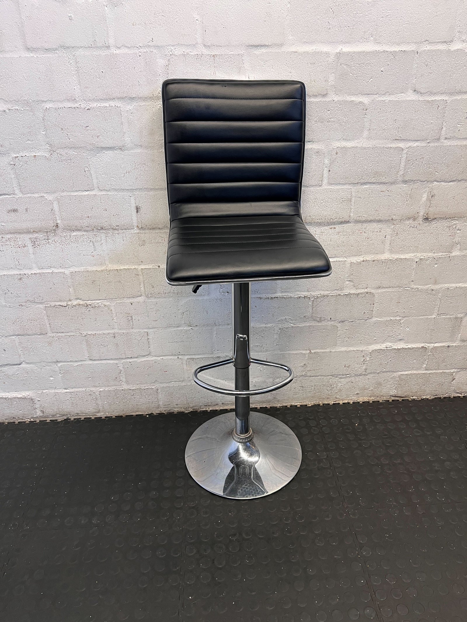 Sleek Black Adjustable Bar Stool with Chrome Base