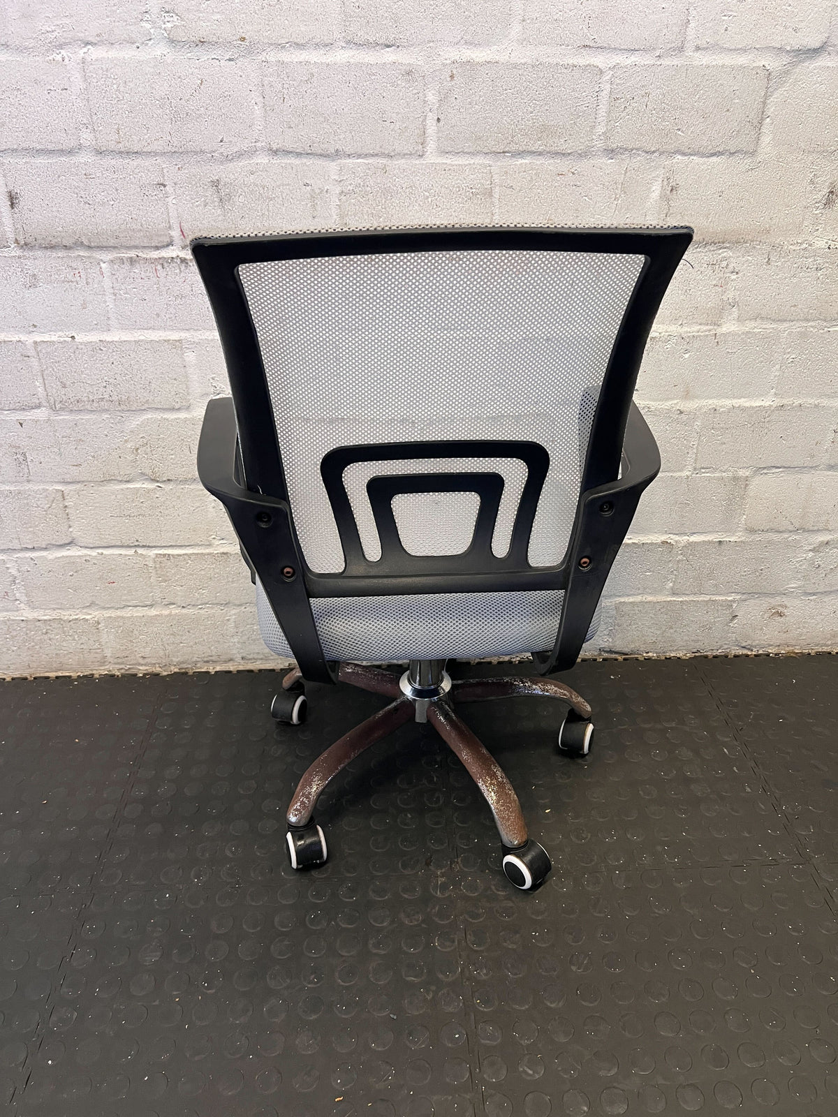 Comfortable Gray Mesh Office Chair with Minor Wear