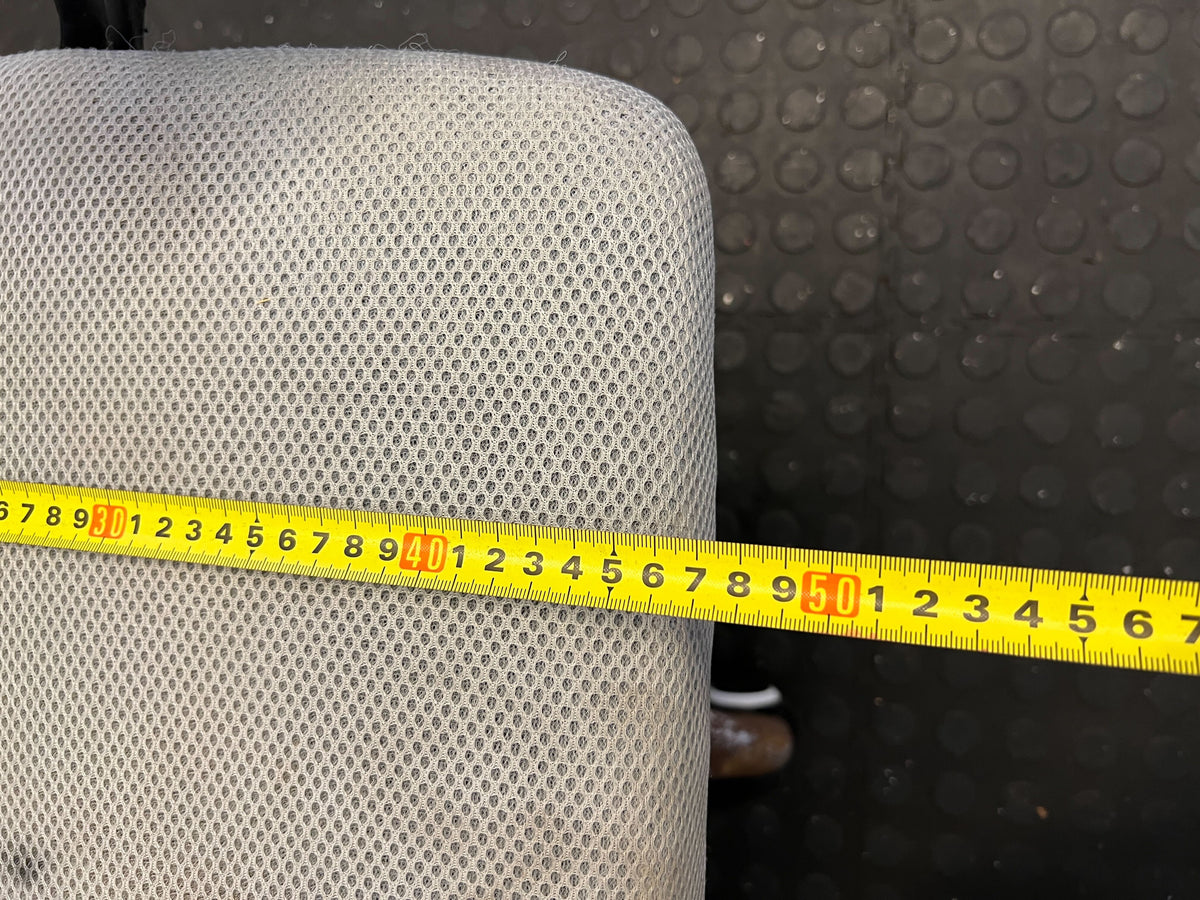 Comfortable Gray Mesh Office Chair with Minor Wear